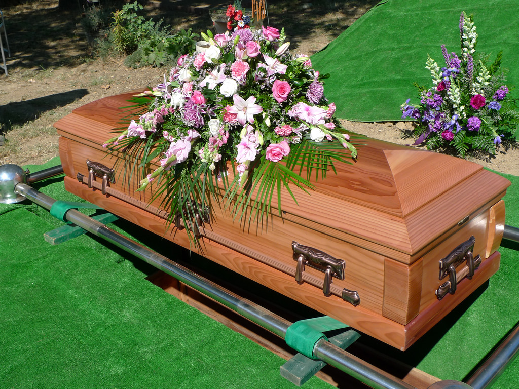 What is the difference between a casket and a coffin?